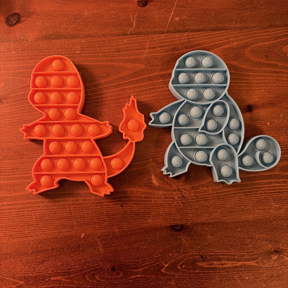 2 Pokemon Pop It Toys ( Squirtle &‎ Charzard)